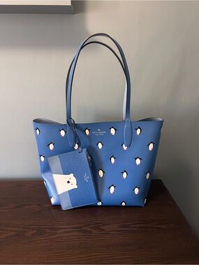 kate spade blue reversible penguin-print tote with detachable pouch